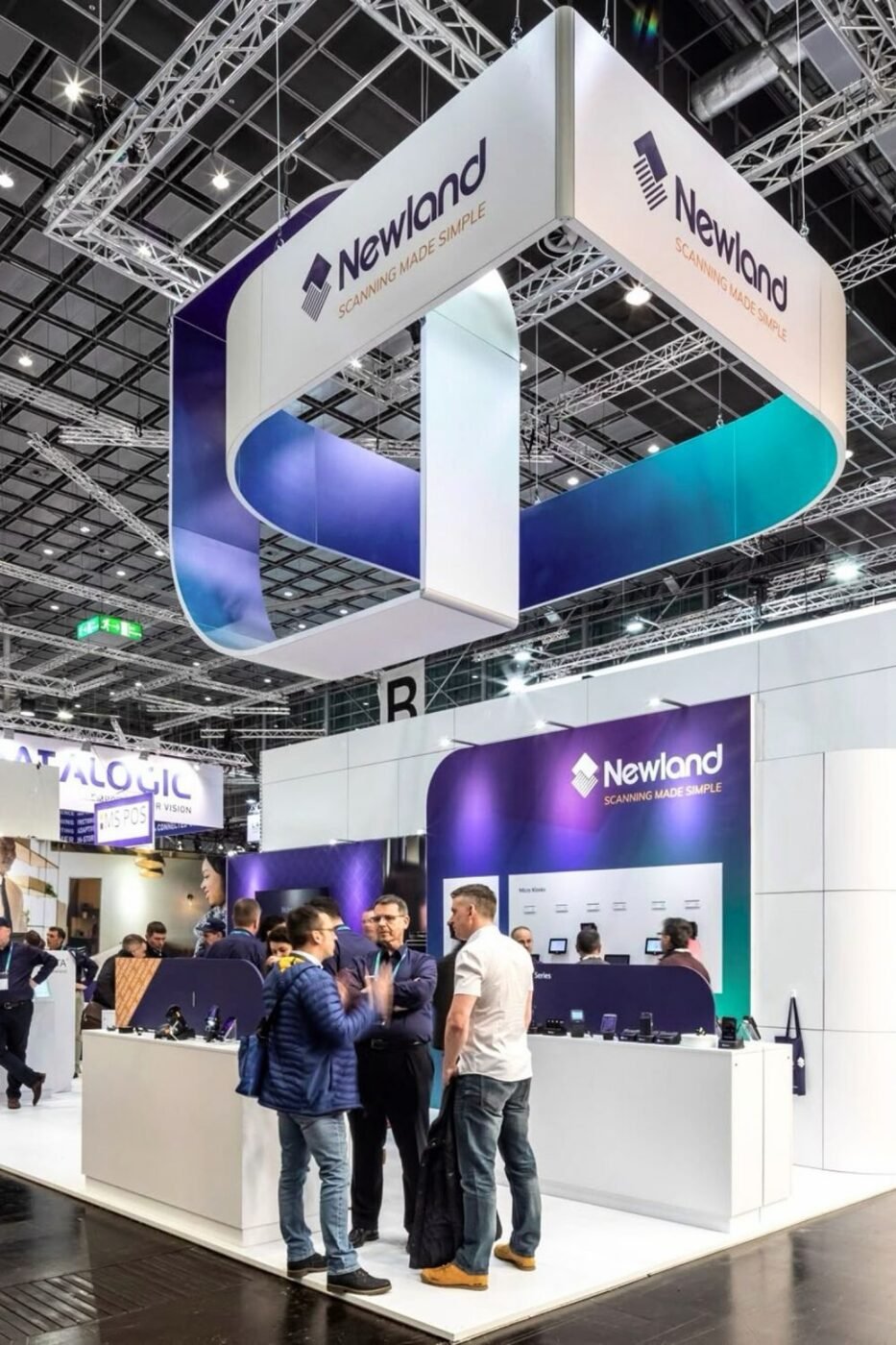 Exhibition stall with hanging identity readable from the aisle